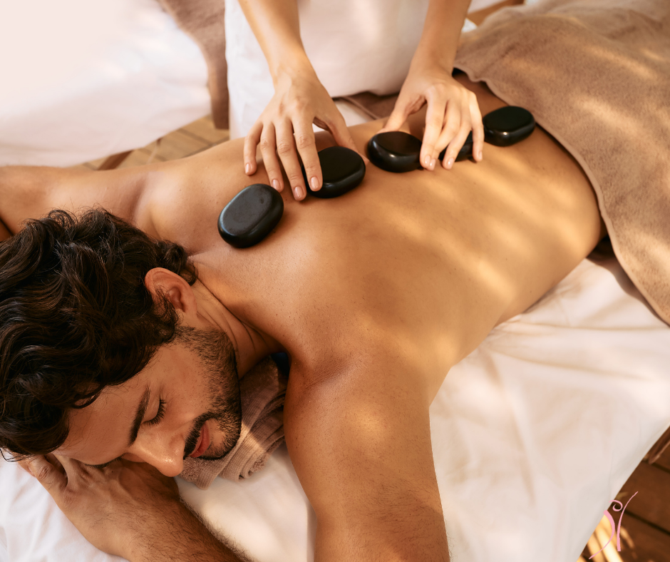 Man Receiving Hot Stone Massage